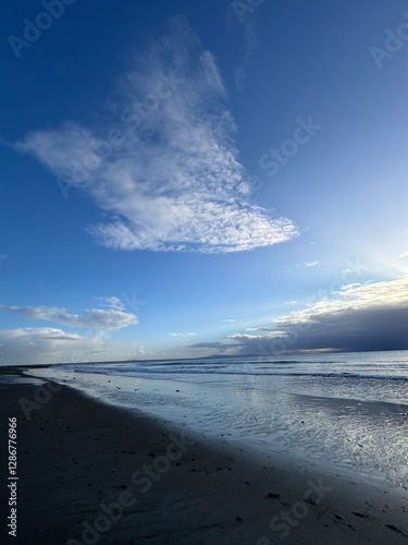 swept cloud beach