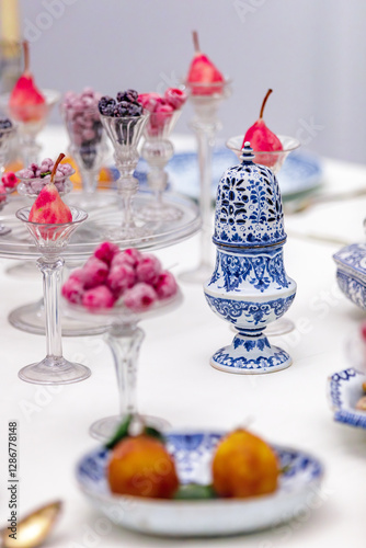 ROUEN, NORMANDY, FRANCE - 2025: Ceramics Museum, reconstitution of a dining room with tableware made of blue Rouen faience, 