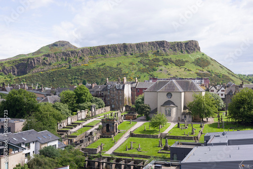 Canongate Kirk, Salisbury Crags and Arthurs Seat, Edinburgh UK photo