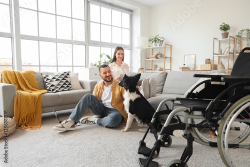 Young couple with dog and w...