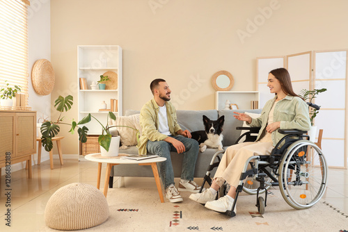 Young woman in wheelchair, ...
