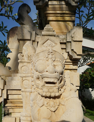 A stone statue that symbolizes the guard of the gate of a house or palace