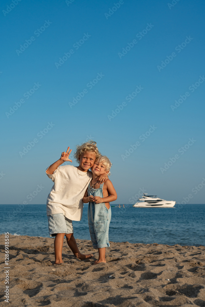 Heartwarming Sibling Bonding Moment on a Sunny Beach Heartwarming Sibling Bonding Moment on a Sunny Beach