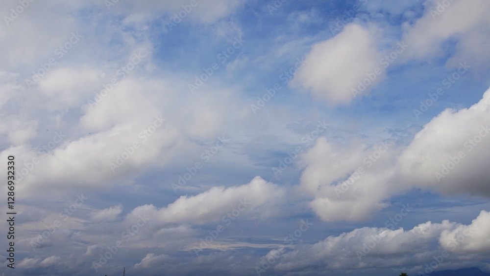 clear afternoon sky with beautiful white clouds, perfect for background clear afternoon sky with beautiful white clouds, perfect for background