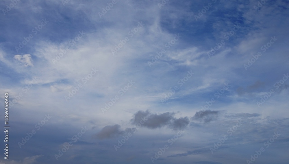 Bright blue sky with beautiful white clouds, suitable for background Bright blue sky with beautiful white clouds, suitable for background