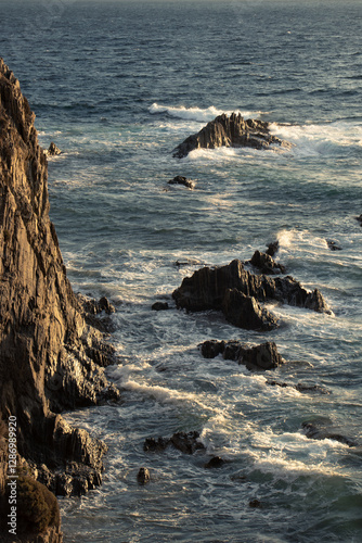 Fototapeta Naklejka Na Ścianę i Meble -  sunset, rock, waves