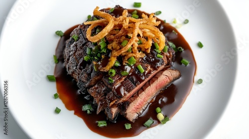 Obraz na płótnie Top Down View of Plated Steak with Fried Onions and Brown Sauce on a White Plate w salonie