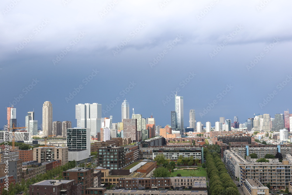 Obraz premium Vibrant Daytime Views of Rotterdam – Bustling Cityscape and Modern Architecture