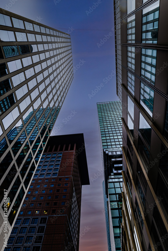 Naklejka premium Night view from below skyscrapers of Frankfurt am Main