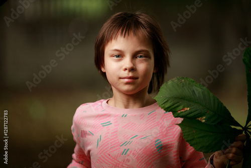Obraz na płótnie Portrait of little adorable girl walking in park w salonie