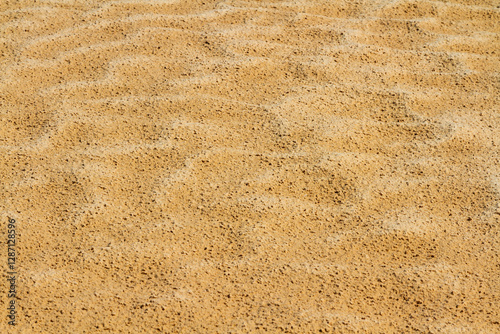 Close-up. Texture. Sahara, small pebbles and sand. Hamada background. Natural pattern. photo