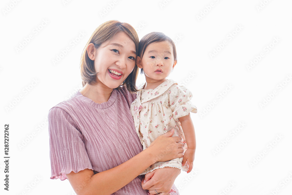 Φωτογραφία 赤ちゃんを抱っこするお母さん