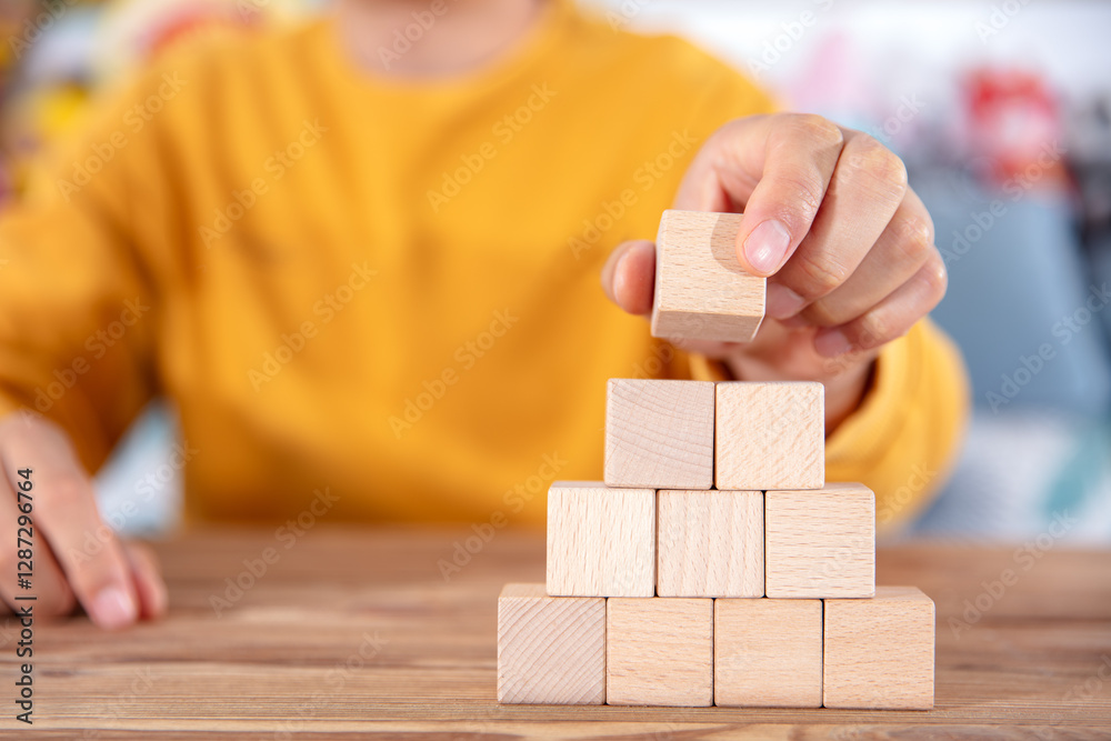 Stacking blocks on the table Stacking blocks on the table
