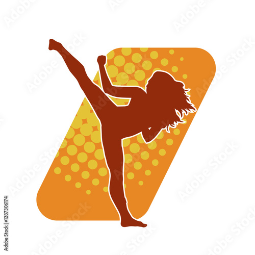 Silhouette of a woman kicking pose. Silhouette of a female martial art in action pose.