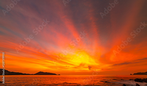 Amazing colorful clouds in sunset or sunrise sky over sea nature landscape background
