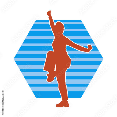 Silhouette of a slim female doing martial art pose. Silhouette of a martial art woman in action pose.