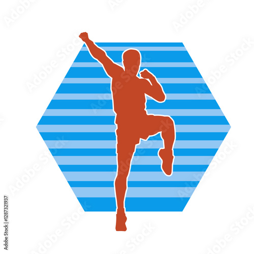 Silhouette of a sporty male in action pose at the gym. Silhouette of a slim man in aerobics workout pose.