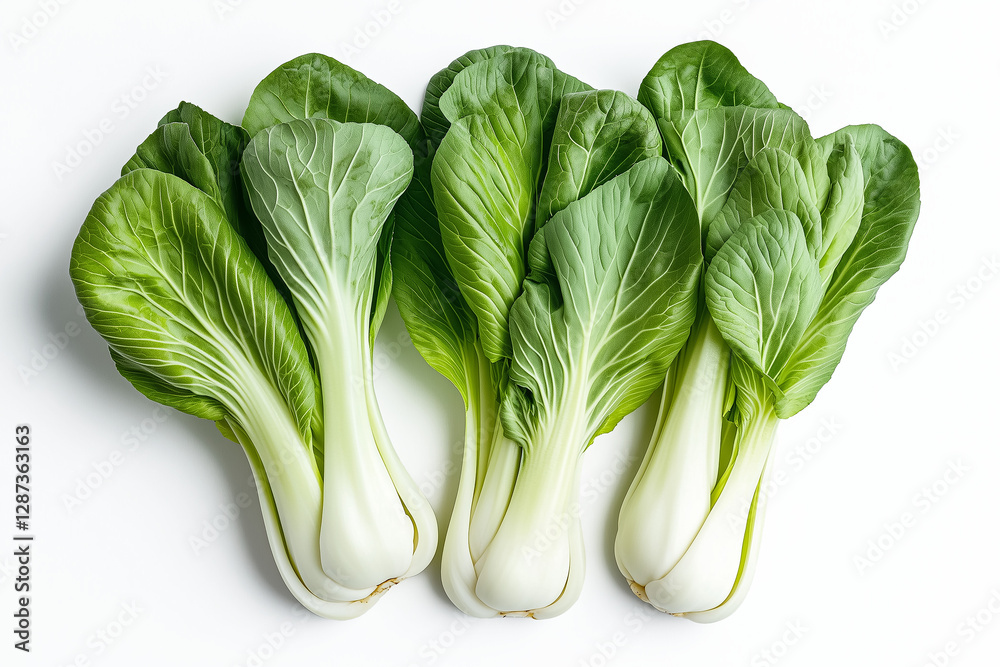 A loose fresh bok choy naturally arranged, isolated on a white background A loose fresh bok choy naturally arranged, isolated on a white background