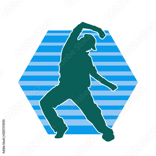 Silhouette of a male dancer in performing pose. Silhouette of a dancing man.