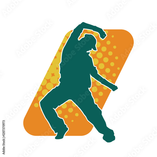 Silhouette of a male dancer in performing pose. Silhouette of a dancing man.