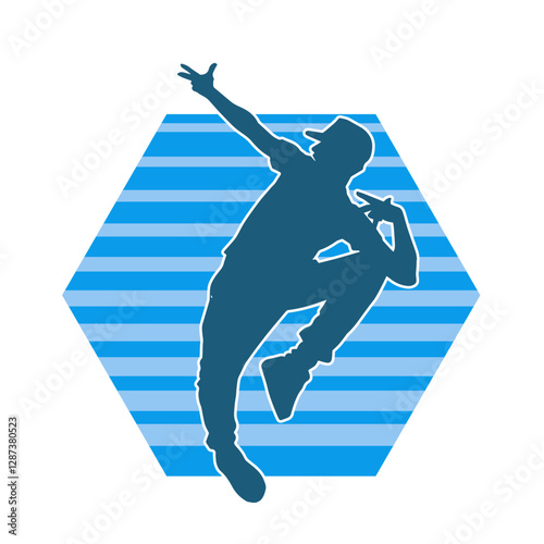 Silhouette of a slim man dancing pose. Silhouette of a male dancer in action pose.