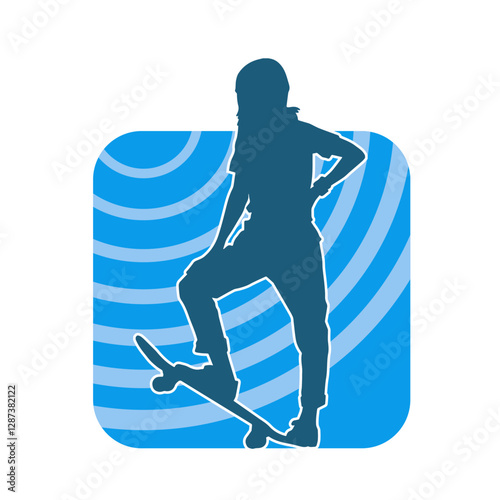 Silhouette of a female in action pose on skateboard. Silhouette of an urban girl on skateboard.
