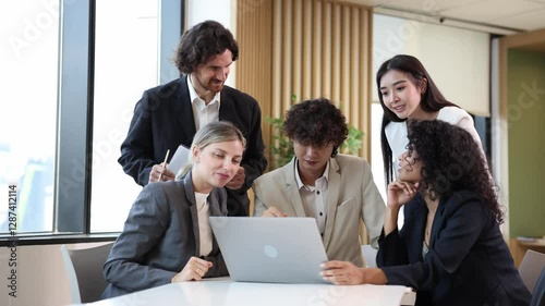 Team of diversity business people are discussing over the new strategic strategy project on investment real estate while working in modern office building for new project and planning