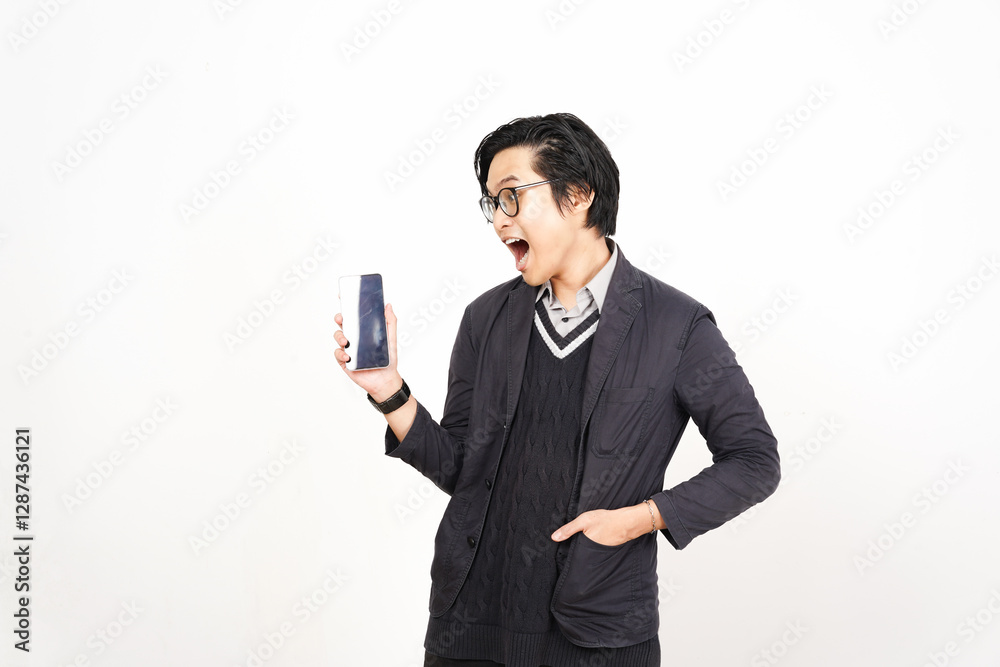 WOW Shocked face Holding Smartphone and Presenting blank screen for copy space Of Handsome Asian Man Isolated On White Background WOW Shocked face Holding Smartphone and Presenting blank screen for copy space Of Handsome Asian Man Isolated On White Background