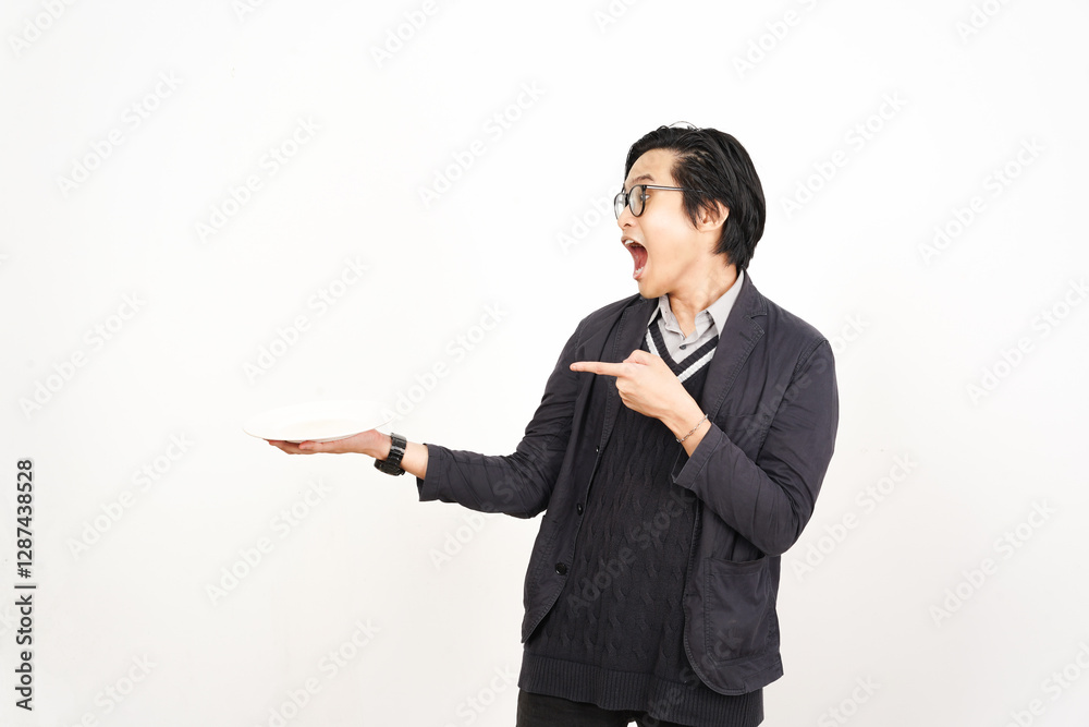 Holding and Showing Empty Plate for copy space food Of Handsome Asian Man Isolated On White Background Holding and Showing Empty Plate for copy space food Of Handsome Asian Man Isolated On White Background