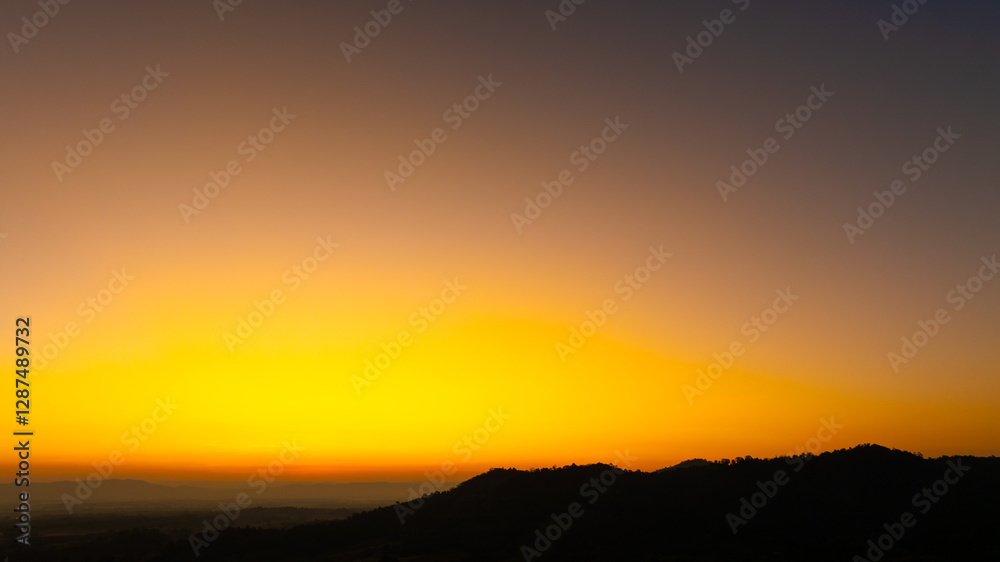Enjoy a panoramic view of the skyline. The sun rises in the morning sky with colorful clouds. and beautiful cloud patterns In the soft light of the morning
Enjoy a panoramic view of the skyline. The sun rises in the morning sky with colorful clouds. and beautiful cloud patterns In the soft light of the morning