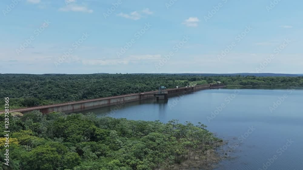 Aerial semi orbit of urugua-i hydroelectric dam surrounded by nature, forest and the uruguay reservoir. Aerial semi orbit of urugua-i hydroelectric dam surrounded by nature, forest and the uruguay reservoir.