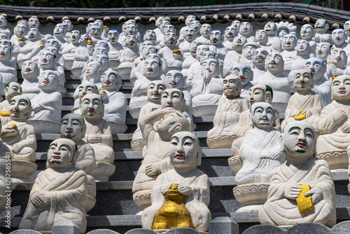 various Buddha statues in the Buddhist temple photo