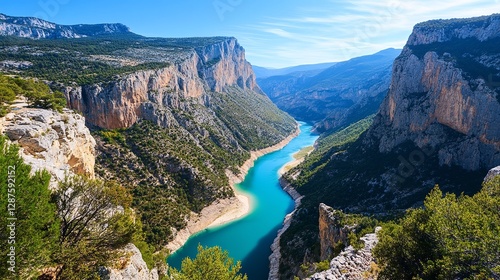 A Stunning Aerial View of the Congost de Mont-rebei Canyon in Catalonia, Spain, with a Turquoise River Flowing Through Towering Cliffs, Amidst Lush Green Vegetation.