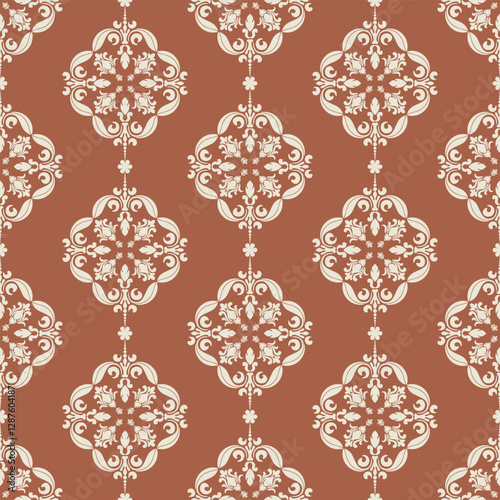The fabric pattern has an intricate and beautiful design. The main elements are cream colored floral and circular ornamental patterns on a reddish brown background.