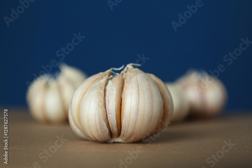 garlic studio shot. garlics clove still life photo with bokeh