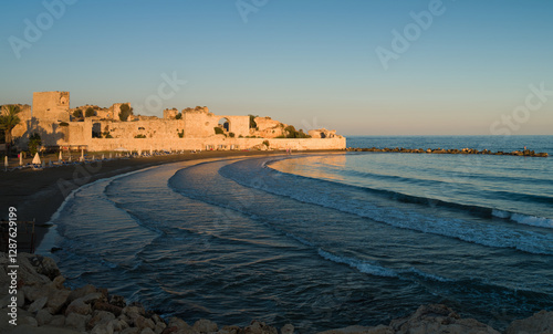 Fototapeta Naklejka Na Ścianę i Meble -  Maiden castle beach and historical city walls. Mersin city, Turkey country 