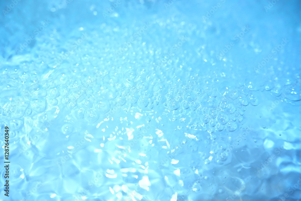 Obraz premium Blue water texture. Bubbles and bubbling water.