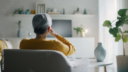 Dementia symptoms in a senior person struggling to remember how to tie their shoes. Featuring forgetfulness and confusion