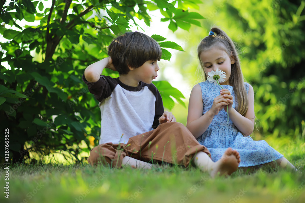 Children walk in the summer in nature. Child on a sunny spring morning in the park. Traveling with children. Children walk in the summer in nature. Child on a sunny spring morning in the park. Traveling with children.