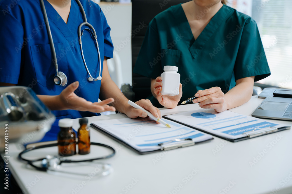 Doctors and nurses collaborate on medical treatment and prescription plans, analyzing data Doctors and nurses collaborate on medical treatment and prescription plans, analyzing data