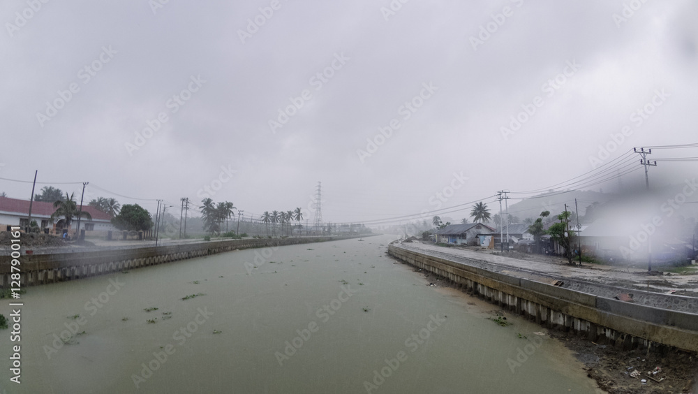 Fototapeta premium Overcast River Landscape on a Rainy Day