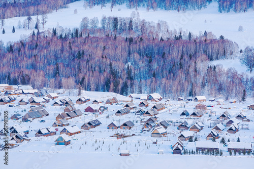 Hemu Village, Snowy Mountains, Forests, and Winter Snow Scenery in Xinjiang Uygur Autonomous Region, China On March 1st, 2023