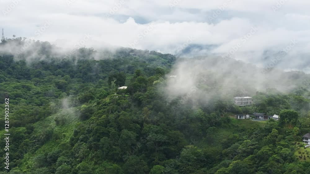 Experience the stunning aerial view of Costa Rica, where picturesque houses sit amidst lush, foggy forests, creating a vibrant tropical paradise that invites exploration and wonder Experience the stunning aerial view of Costa Rica, where picturesque houses sit amidst lush, foggy forests, creating a vibrant tropical paradise that invites exploration and wonder