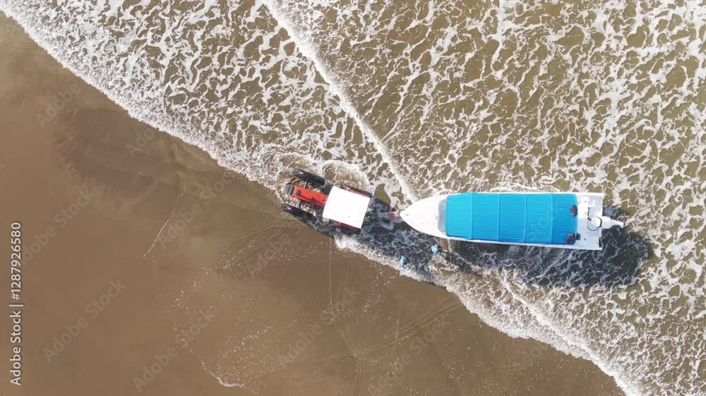 An aerial view captures a vibrant yellow tractor, energetically towing a boat towards the surf in beautiful Costa Rica, vividly illustrating the lively essence of tropical maritime life An aerial view captures a vibrant yellow tractor, energetically towing a boat towards the surf in beautiful Costa Rica, vividly illustrating the lively essence of tropical maritime life