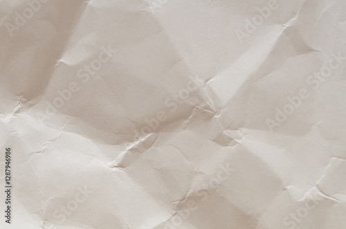 Crumpled white paper texture with natural wrinkles