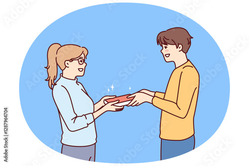 Guy student passes book to girl for concept of school love or joint preparation for exams. Enamored schoolboy and schoolgirl holding book to prepare report on instructions of teacher