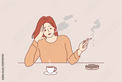 Woman smokes cigarette and drinks hot coffee from cup, sitting at table taking break after difficult work. Stressed girl suffering from tobacco addiction and habit of caffeine for energy.