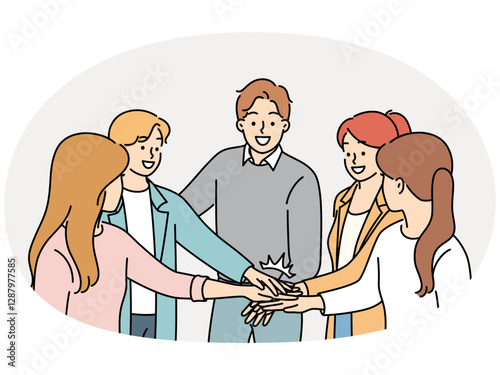 Happy colleagues stack hands involved in teambuilding