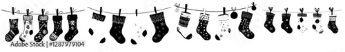 Vibrant socks made of cotton and wool are draped over a clothesline, secured by clothespins, as part of a family's laundry, which includes an array of colorful clothing and cartoon-inspired modern