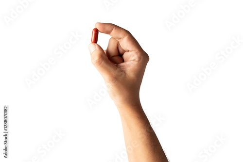 Male hand holding a red pill isolated no background